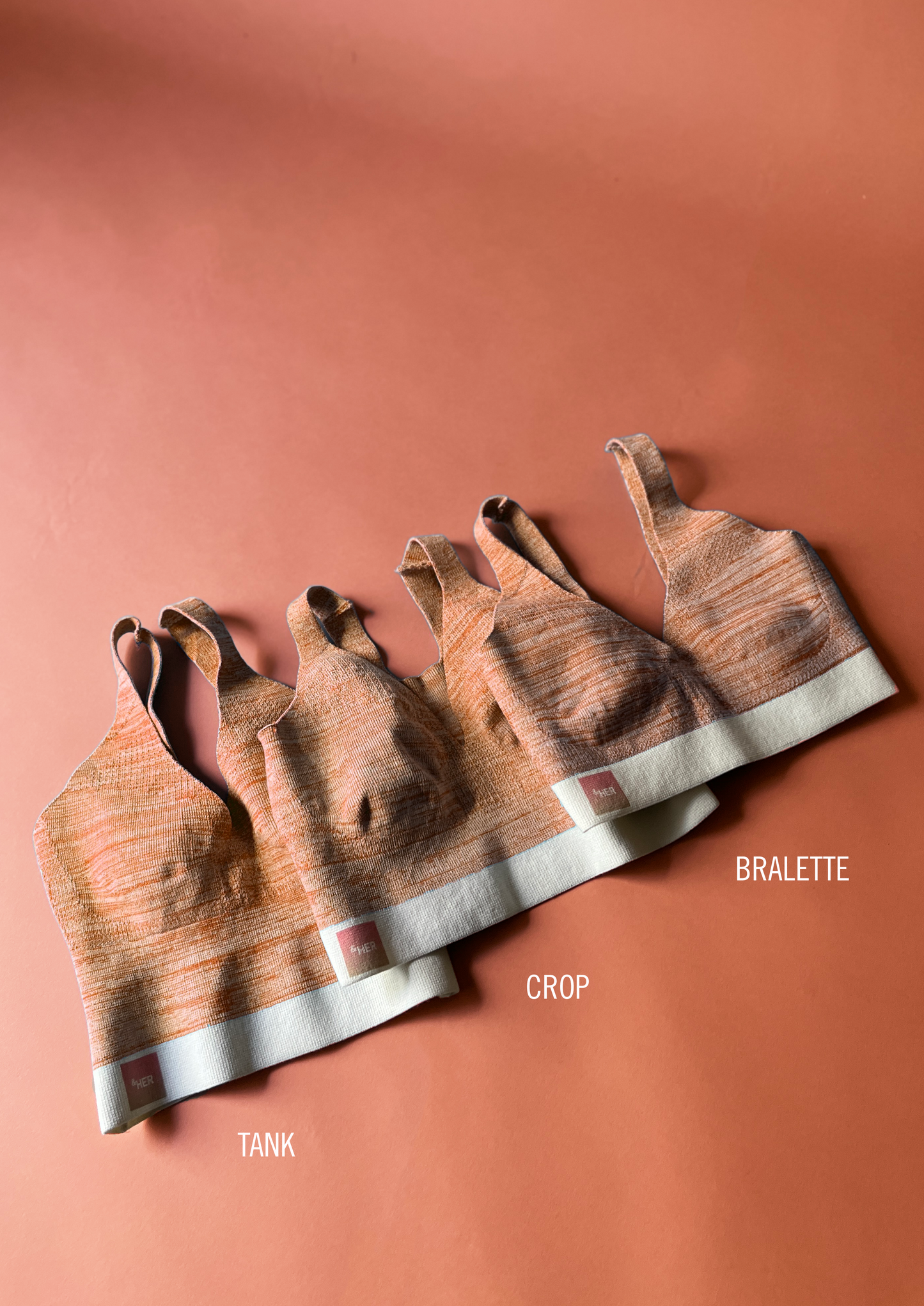 &HER orange ice v neck crop bra compared with bralette and tank long line bra.