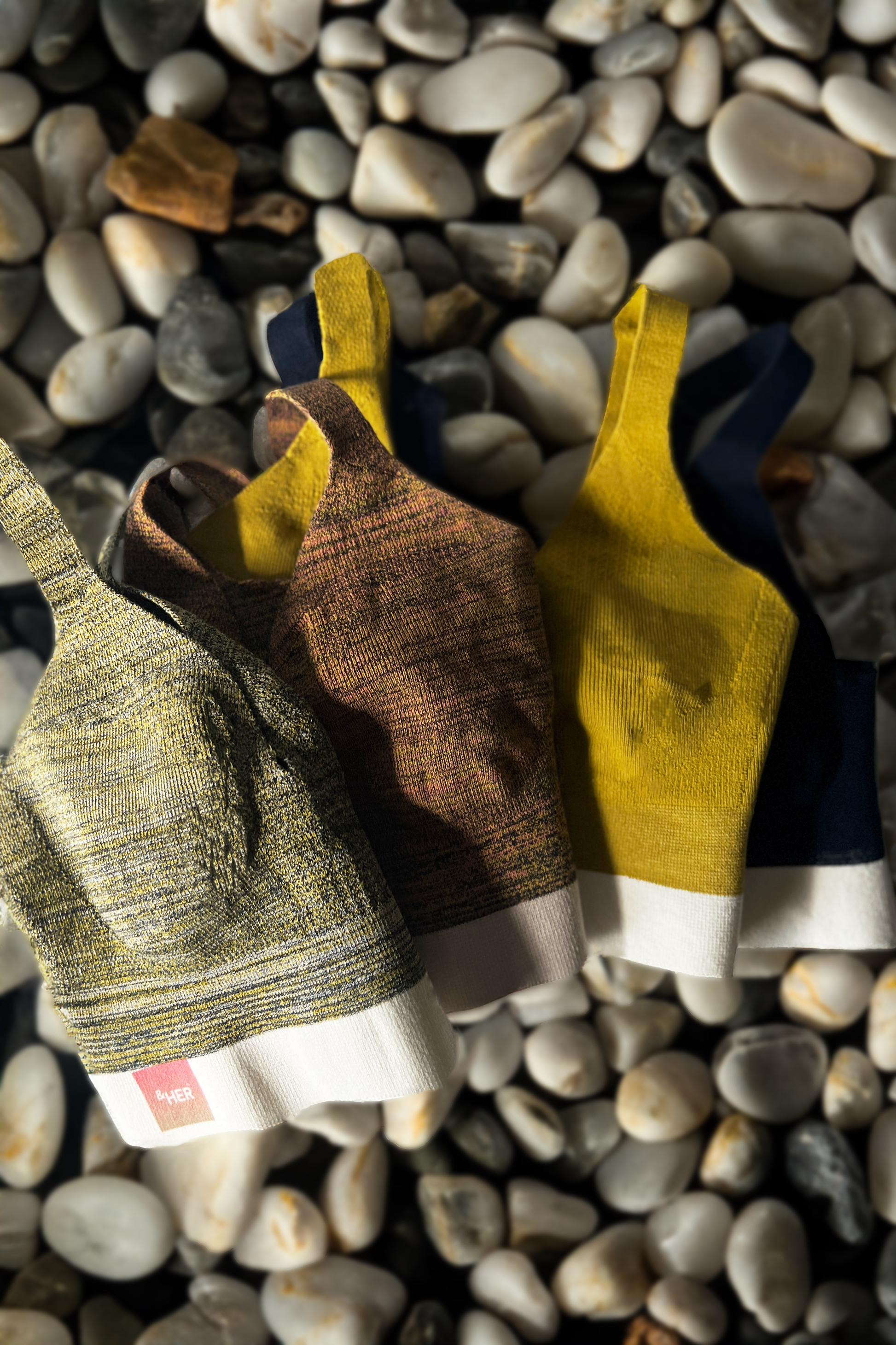 &HER hemp bra collection in mineral jaspe, citrine, sulfur gold, and royal blue